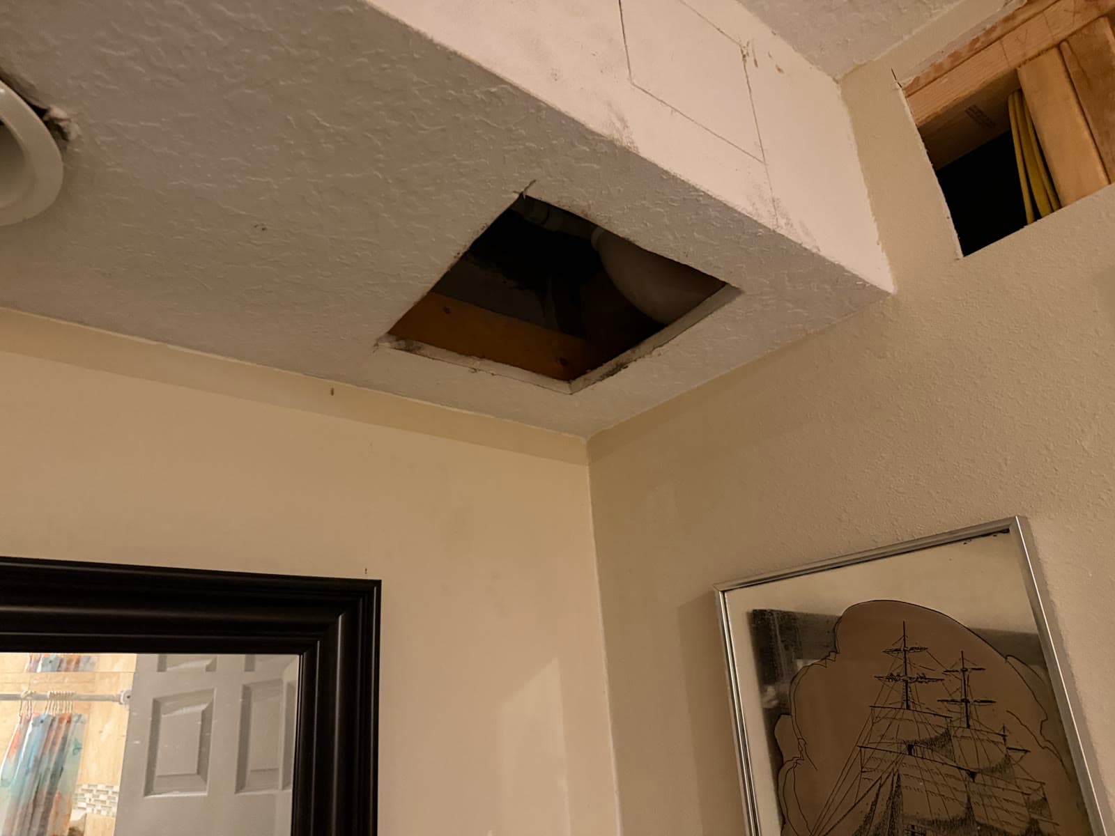 Ceiling access opening before drywall repair after home repiping in Melbourne FL