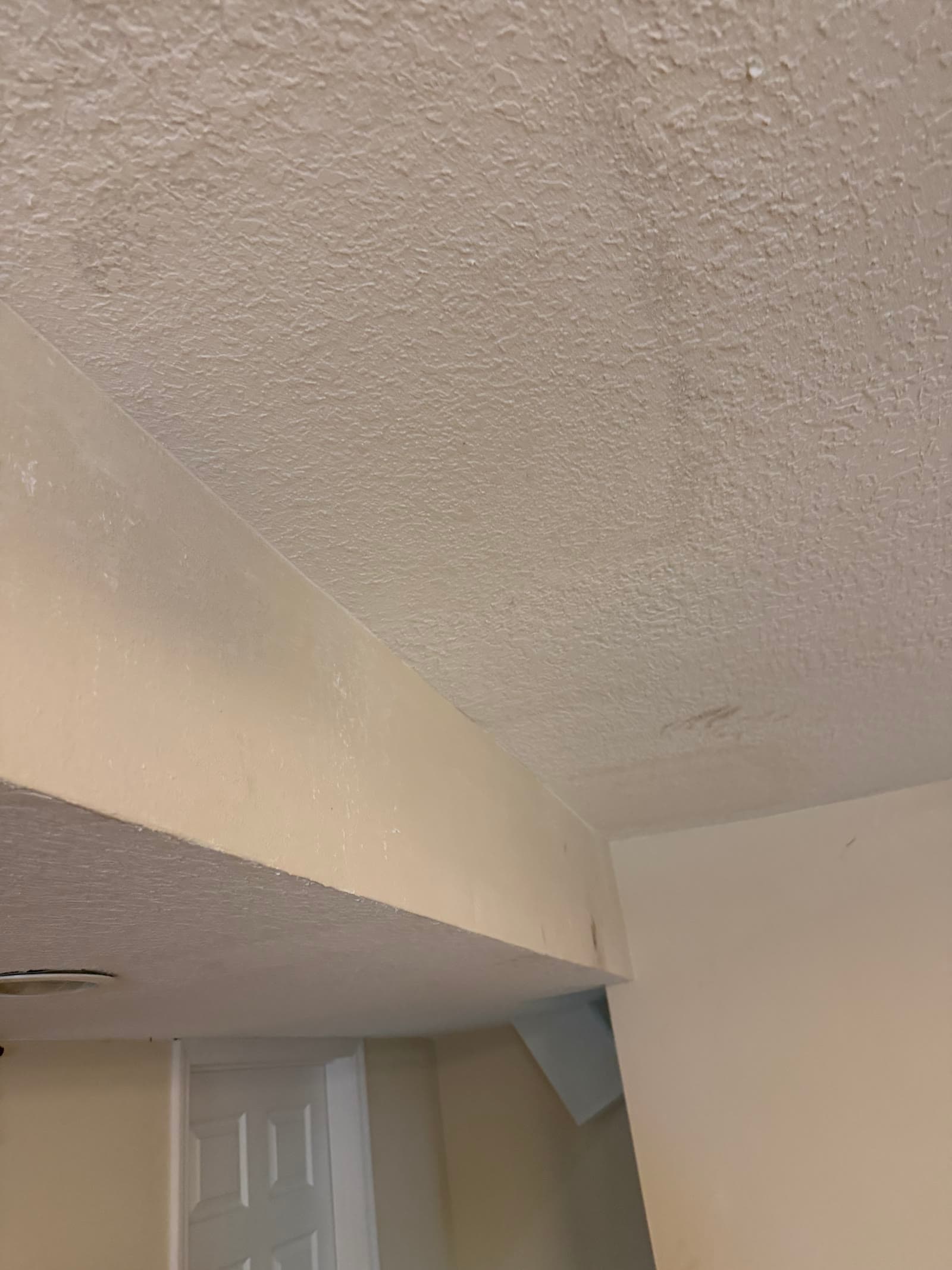 Finished interior wall patch after plumbing repipe work in Melbourne FL