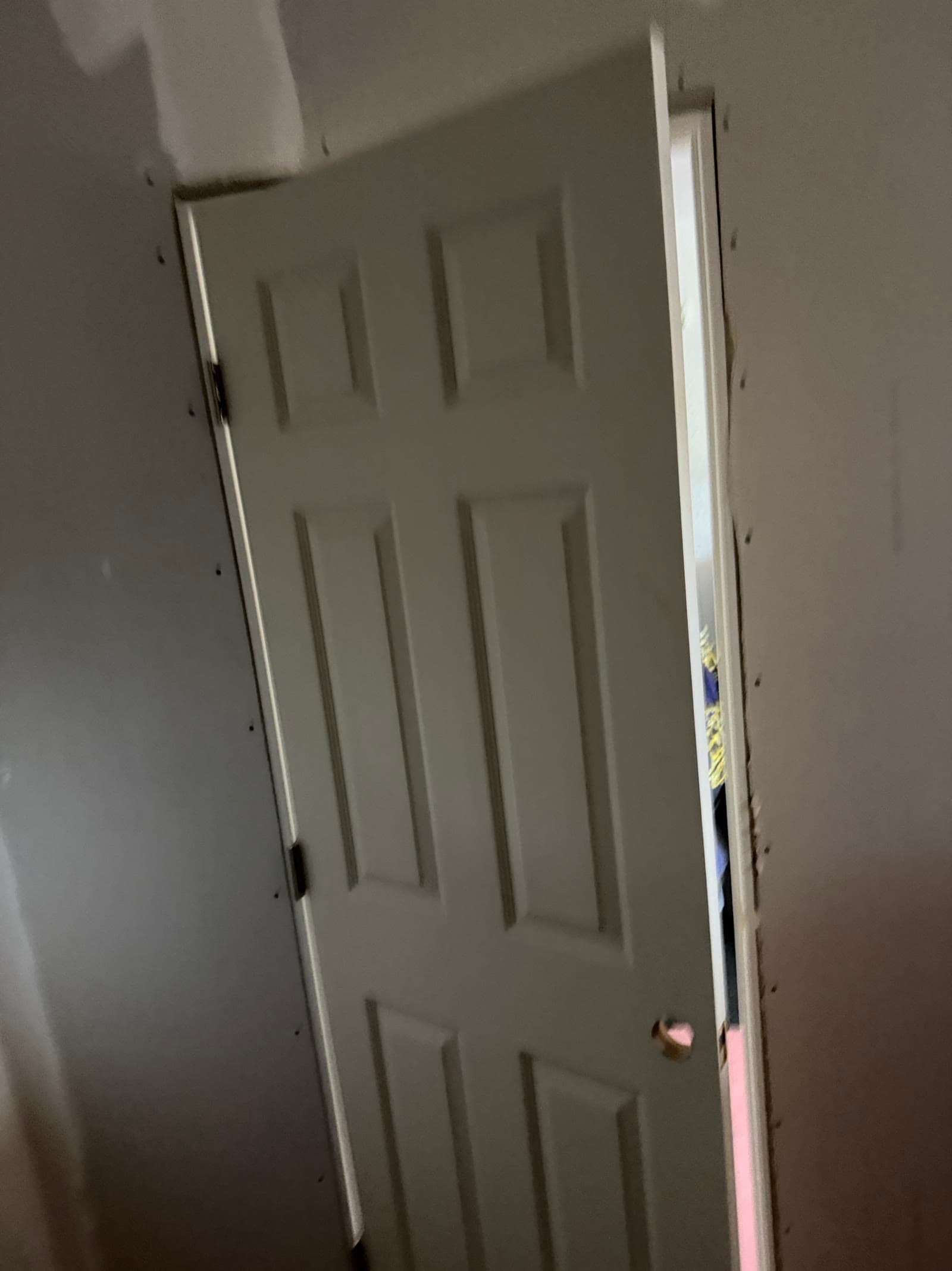 Interior door installation during a Palm Bay barbershop room build-out